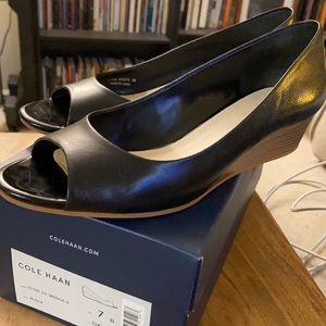EUC Coke Haan black peep-toe wedge pumps